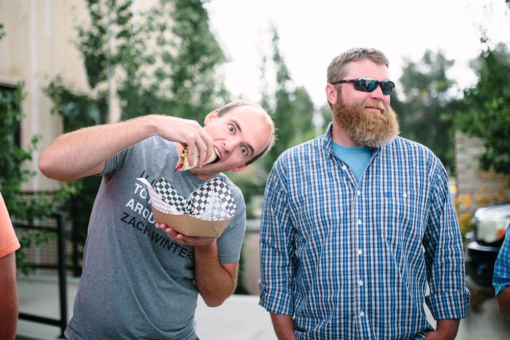 Pierce and Bjorn of Wisetail LMS munch on some tacos.