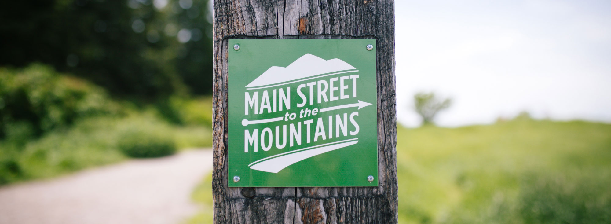 main-street-to-the-mountains-sign