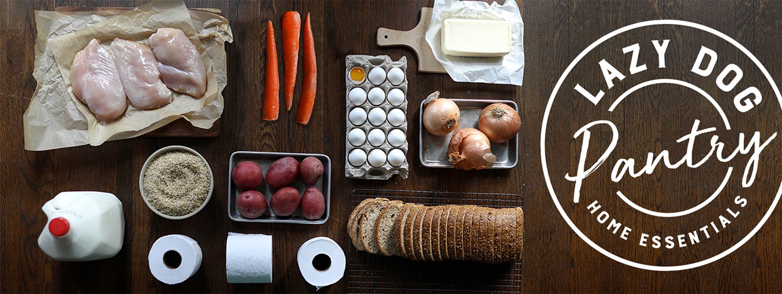 Wisetail LMS client community member Lazy Dog and a group of food they are selling to help people through the Covid-19 pandemic.