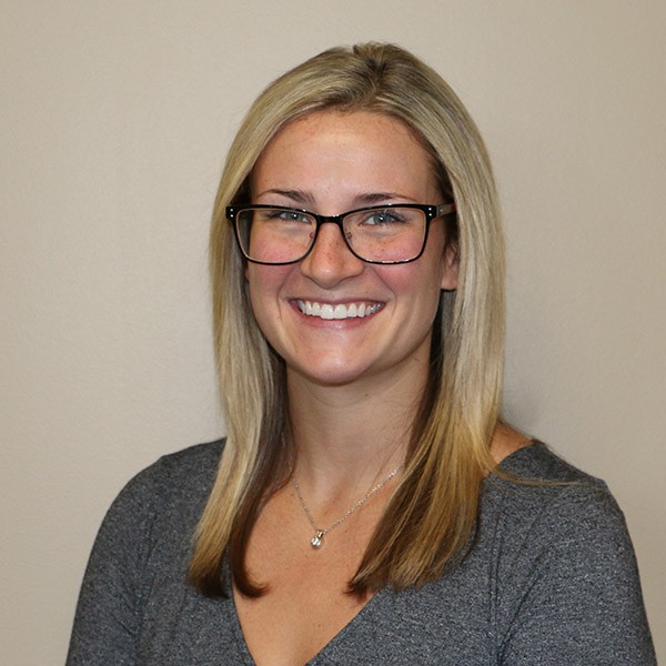 Lumina Foods Executive Assistant, Brooke Snyderman, poses for a photo.