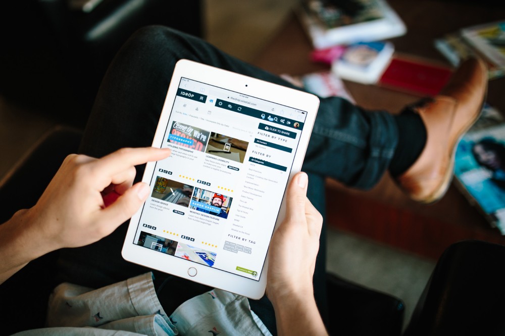 A picture of the Wisetail LMS social features on an iPad.