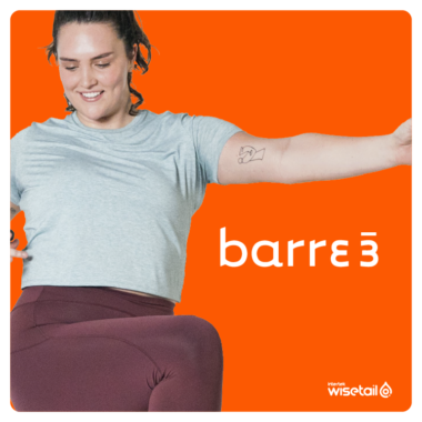 woman doing yoga wearing maroon leggings and grey shirt next to barre3 logo, on orange background