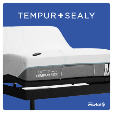 tempur sealy logo on blue background above tempur pedic bed, because tempur pedic is a tempur sealy brand