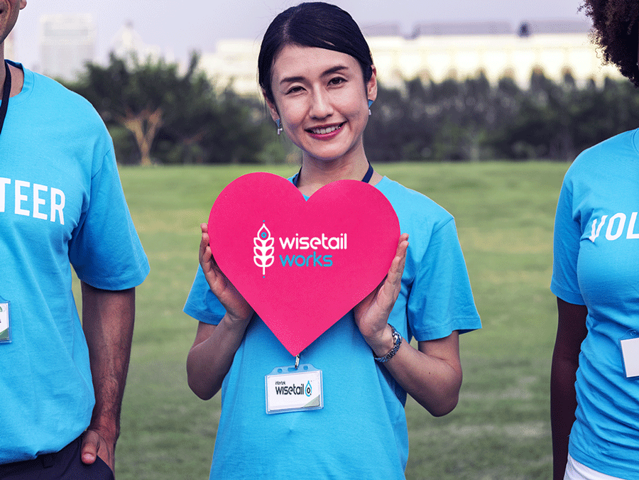 volunteers with a heart image