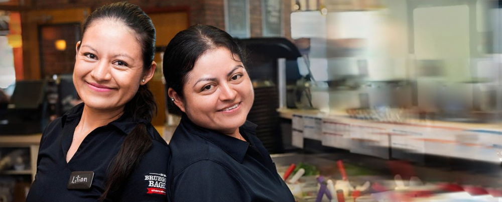 Two Bagel Brands Employees standing side by side