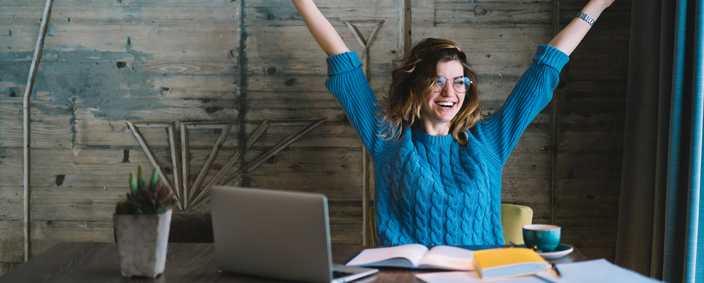 Woman celebrating success in onboarding