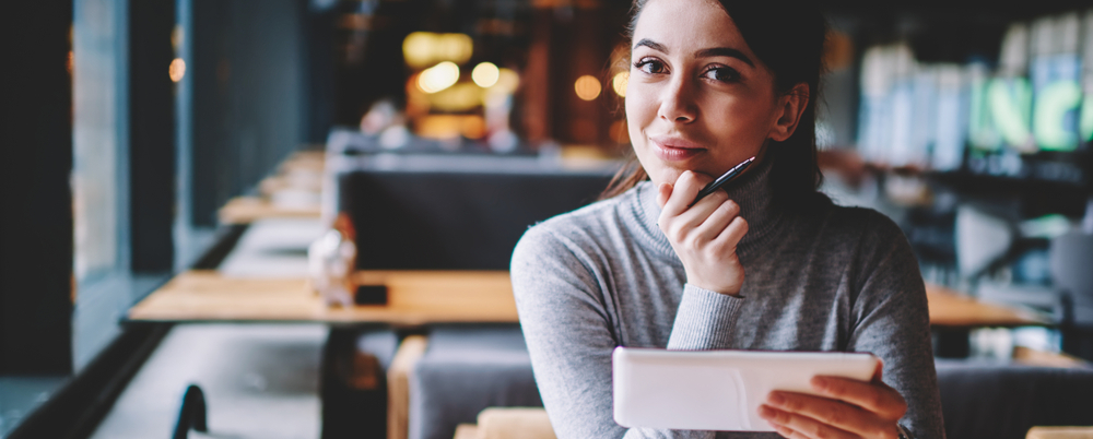 Employee considering how to overcome obstacles in onboarding processes