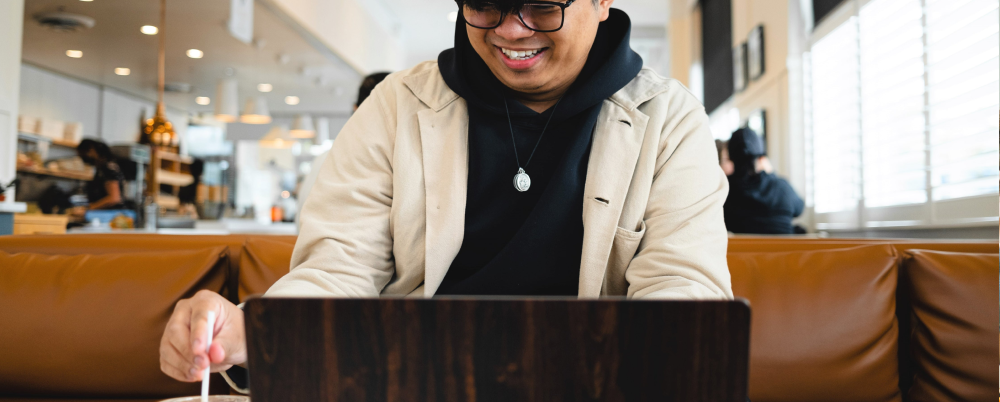 Person using their computer to access the company LMS.