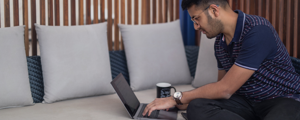 Man working and learning remotely from home.