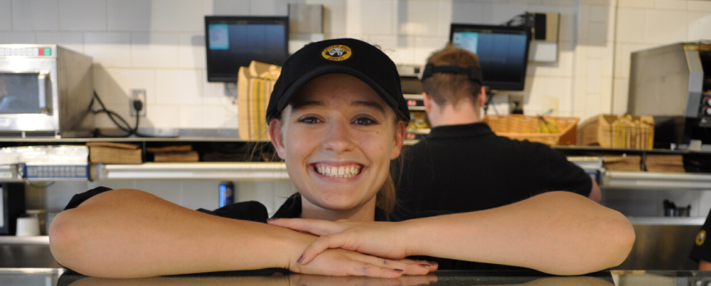 Bagel Brands employee learning her responsibilities