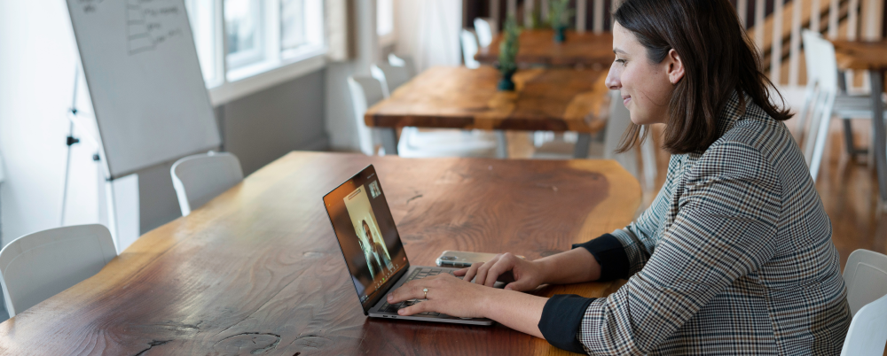 Woman chatting on a virtual call and collaborating