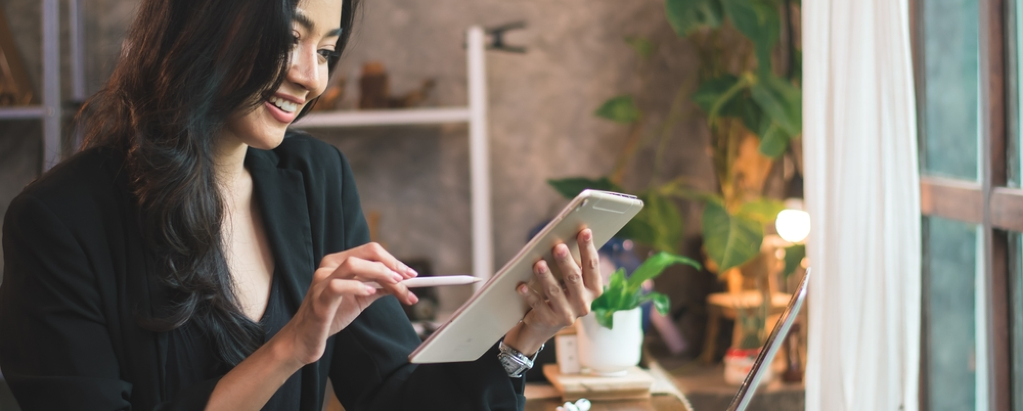 Woman planning the future of learning and development, and preparing for 2023.